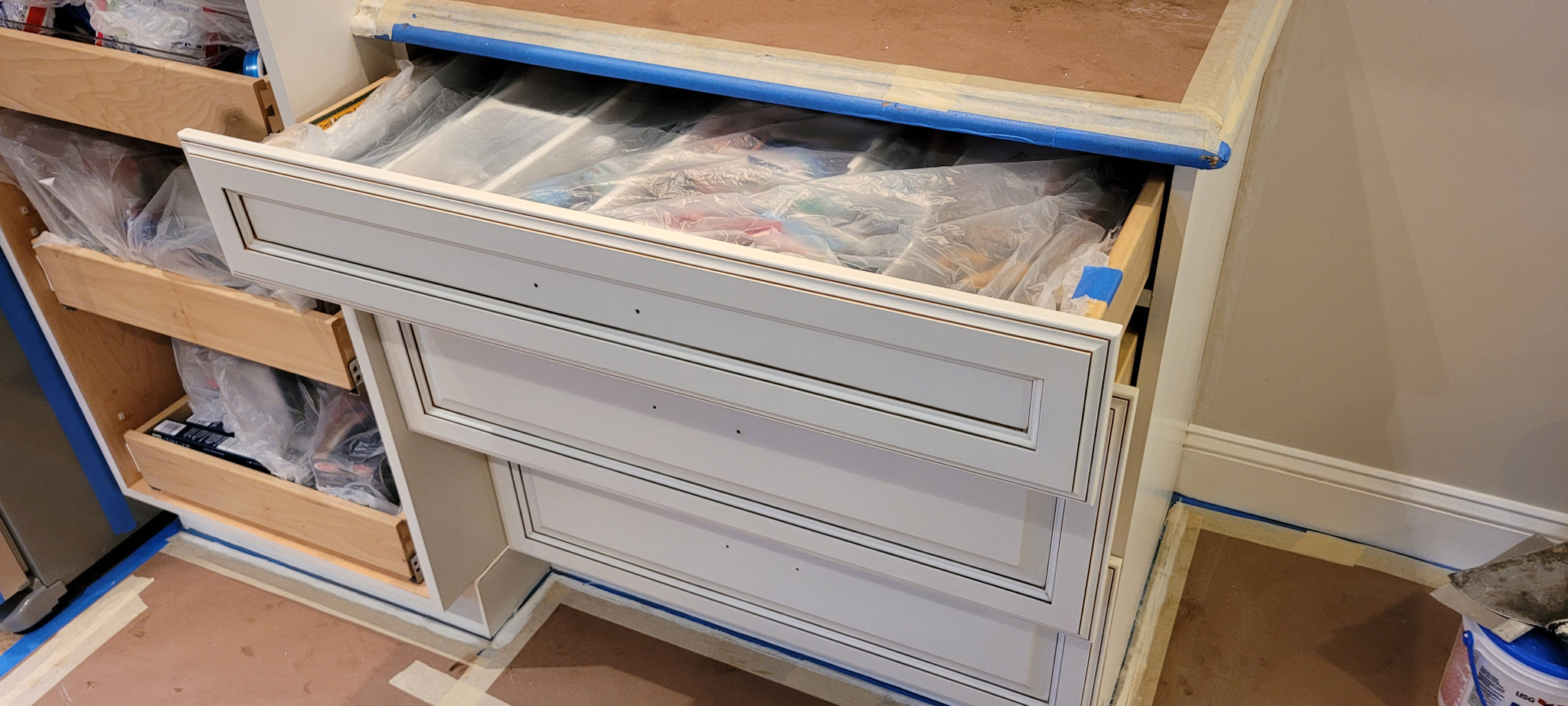 Drawers removed and masking in place