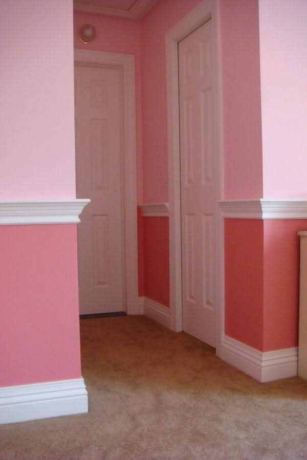 Interior walls with two-tone paint and crisp white trim.
