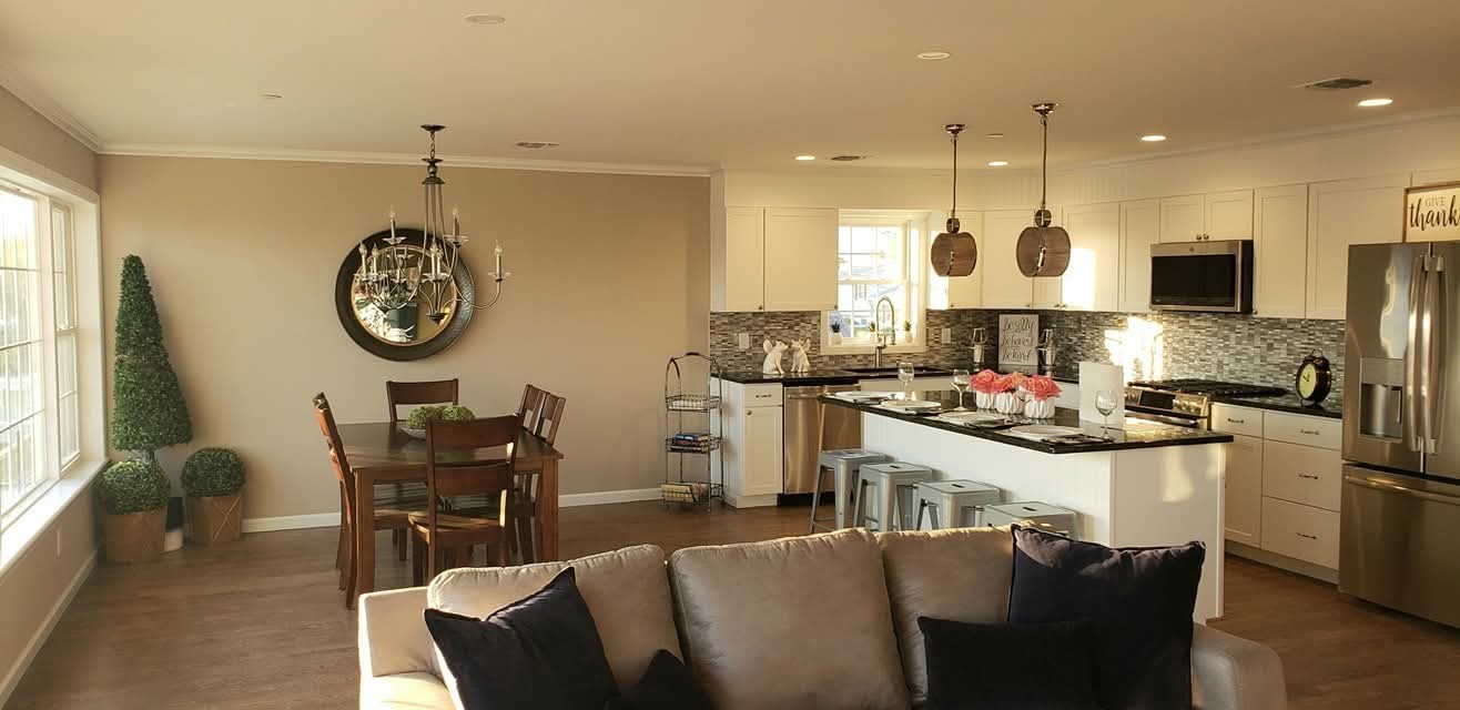 Kitchen and dining area with painted walls, ceilings, trim, and refinished cabinets.
