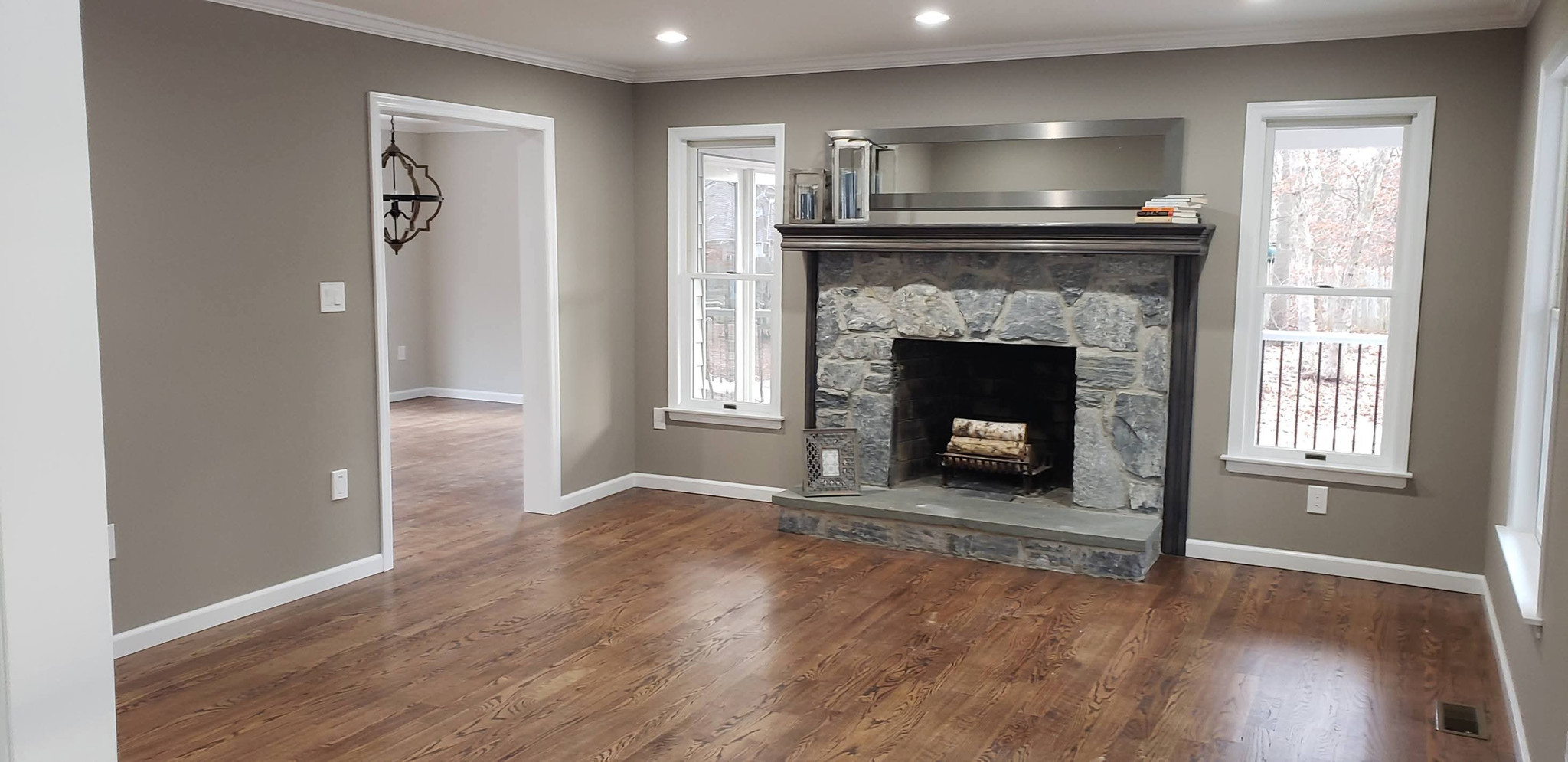 Living room with stone fireplace