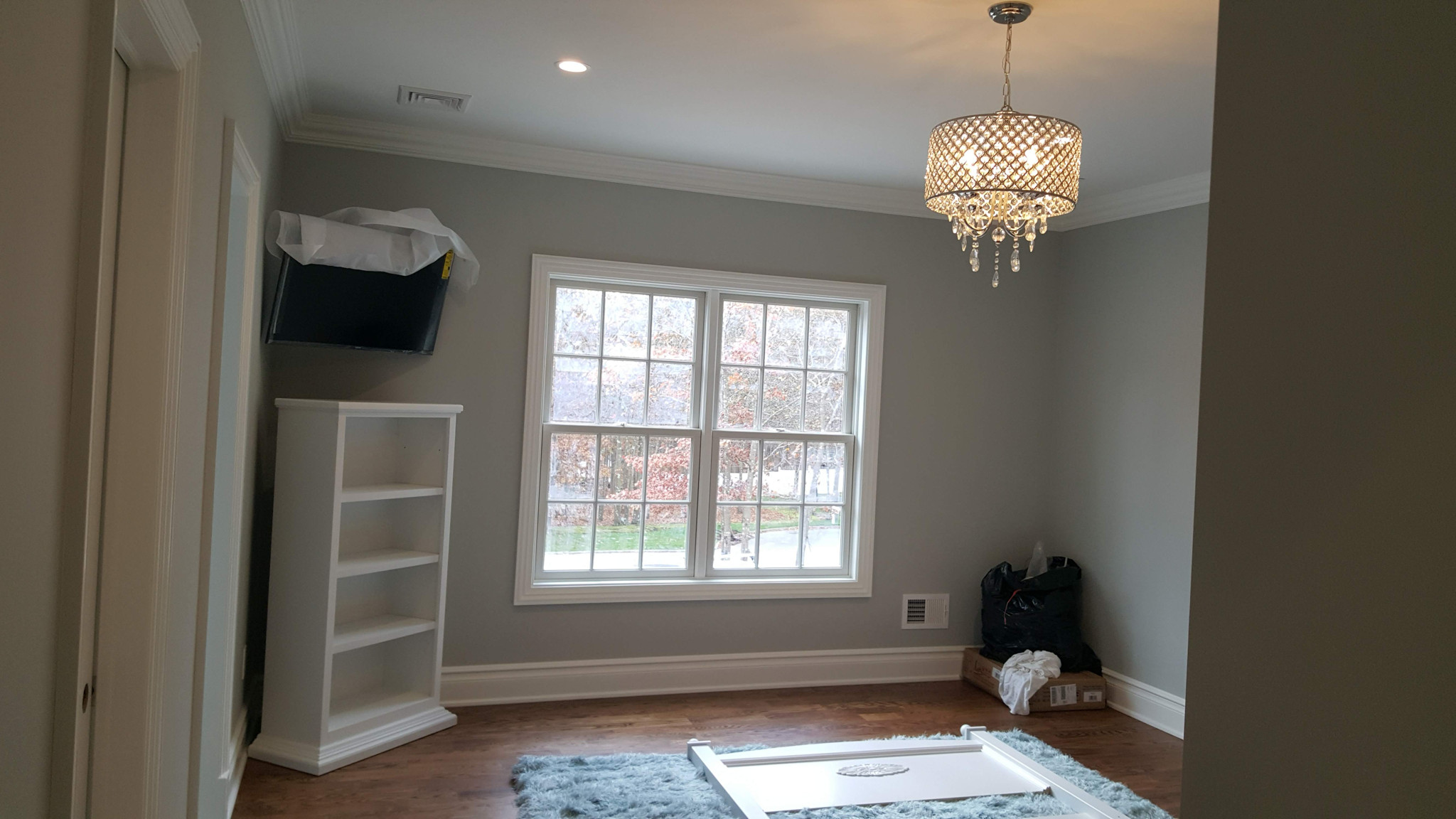 Sitting room with built-in shelving