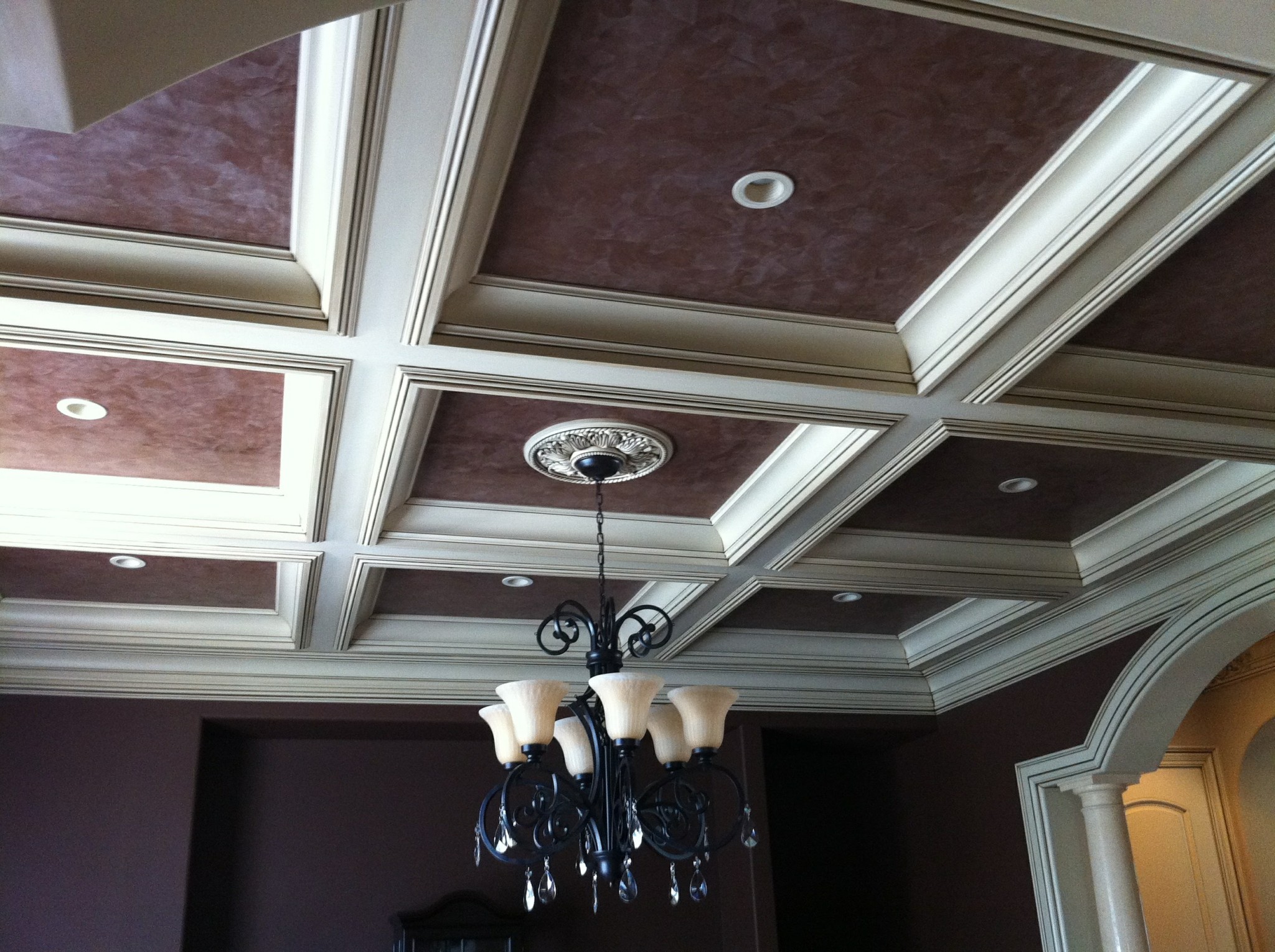 Painted coffered ceiling with faux finish panels and off-white trim